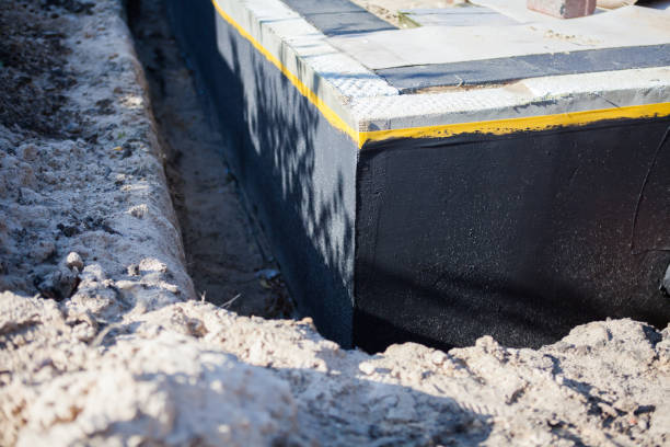 Professional Emergency Waterproofing technician working in Cowlesville, NY
